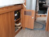 The nearside under-bed cupboard houses the Truma Combi 6 heater and gas bottle locker