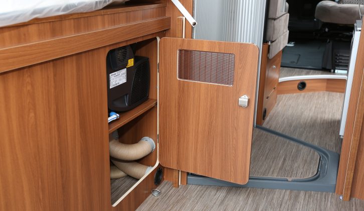 The nearside under-bed cupboard houses the Truma Combi 6 heater and gas bottle locker