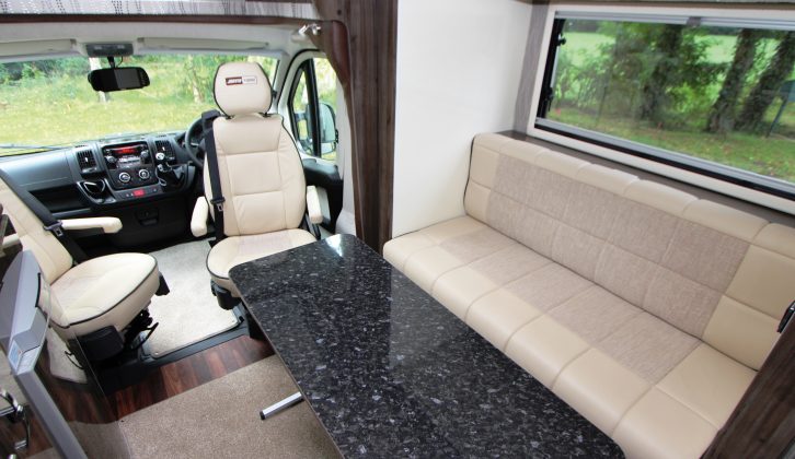 The large and stable freestanding table can be used inside or al fresco – both cab seats swivel and have two armrests