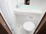 The washroom has a swivel, electric-flush Thetford toilet and a sink with a mixer tap that doubles as the showerhead – read more in Practical Motorhome's Swift Rio 325 review