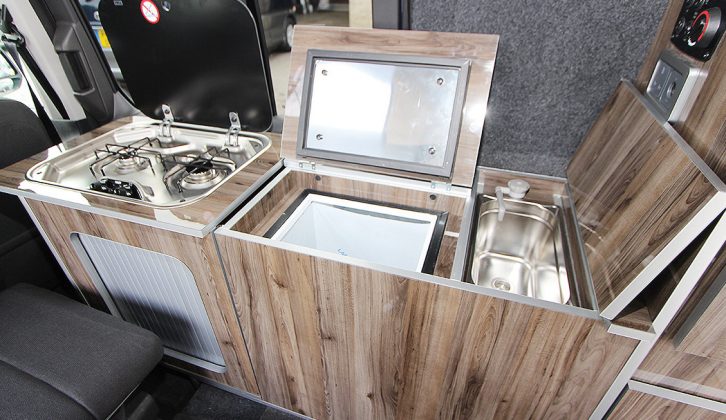 The galley has a hob, sink with pumped water and a top-loading compressor fridge. Other finishes are available