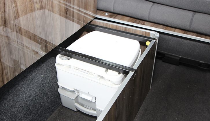A Porta Potti lives under the settee, and luckily the wheel-arch does not compromise the storage here