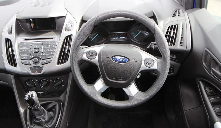 The thumb pads on the steering wheel compromise the view of the small instruments. Everything else is spot-on