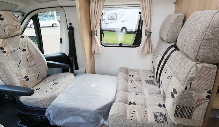Third berth in the dinette is 1.57m x 0.6m (5ft 2in x 2ft) and is made up using the supplied infill cushion – read more in the Practical Motorhome Marquis Majestic 135 review