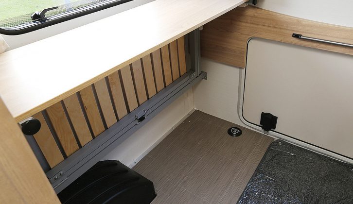Just tip up the parallel seat benches in the rear lounge to reveal a lot of clear floor space!