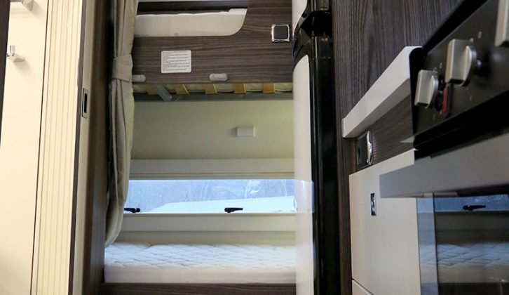 The five-berth Mileo 313 has transverse rear bunks, the remaining beds being the overcab double and a make-up bed in the lounge