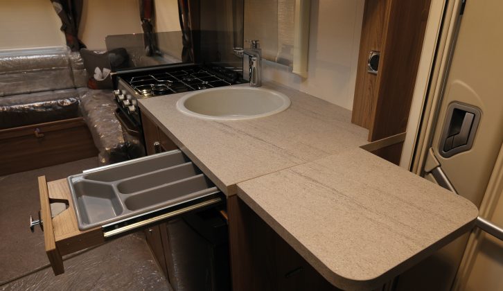 There's a cutlery drawer and a useful fold-out worktop extension – read more in the Practical Motorhome Swift Escape 622 review