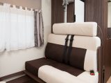 This four-berth motorhome has two travel seats that also make up part of the L-shaped lounge seating