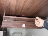 This slimline cupboard in the roof of the garage holds the bed bases and is a clever touch. In use, the bed is very comfy