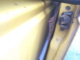We're not sure why the door trim panel parted company from the door during the engine repair work, but this was soon fixed