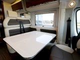 You can seat six people around the dining table in the 670 SC, the seats upholstered here in the ‘White Santos’ cream and chocolate scheme