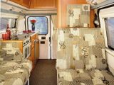 The Bessacarr E350 features a lounge that is forward of the kitchen and washroom
