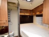 The rear of the Rapido Itineo FB600 has its fixed double bed in one corner and the washroom in the other corner