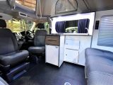 Inside the VW T5-based Rockin Van there's an L-shaped kitchen and swivel front seats