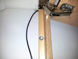 The cable is fed into the right-hand end cupboard and then the left-hand one