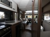 There's plenty of natural light from the windows; the rear of the ’van is on one level but you step up to the front lounge
