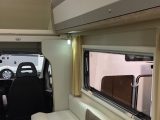 The two-tone lockers in this Venus 590HL also give this motorhome an elegant feel inside