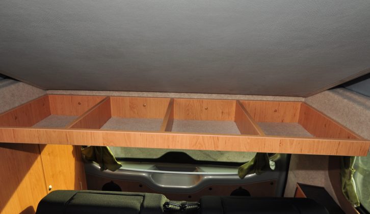 This divided shelf above the rear seat is sealed when the roof is down, keeping things secure when you’re on the move