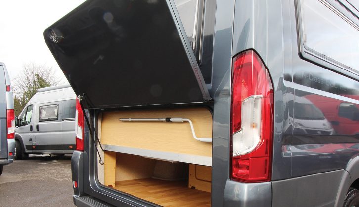 A hinged boot lid opens wide to reveal a large storage area for all touring essentials. Beautifully moulded back panel, too