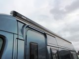 Linear ribbon lights adorn the full length of the awning and over the door. You get style and substance in equal measure