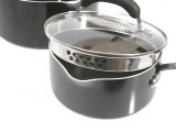 Each pan has two pouring lips which, used with the holes drilled into the lids' sides, mean you won't need a collander