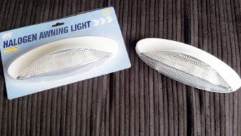Eureka! I could use these awning lights  (£12 each) to house cameras. They are secured with self-tapping screws