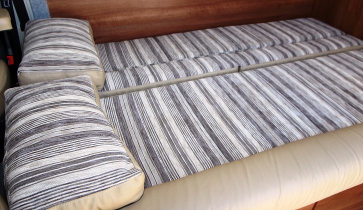 It's easy to make up the double bed: the cleverly-sized, softly-filled scatter cushions double as pillows, then you just cover it with a slip
