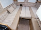 Choose two long single beds, a huge longitudinal double, or this transverse double which retains some seating