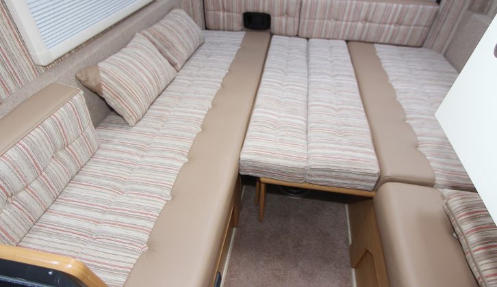 Choose two long single beds, a huge longitudinal double, or this transverse double which retains some seating