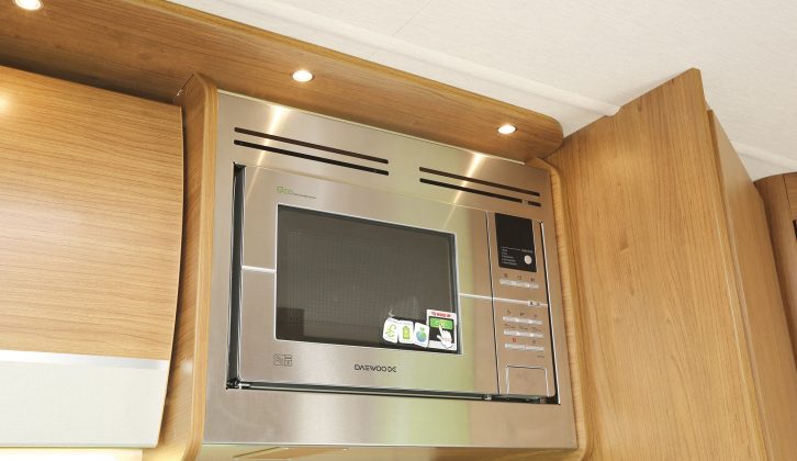 The Imala kitchen specification includes a microwave oven, dual-fuel hobs, separate oven and grill and a dual-fuel fridge