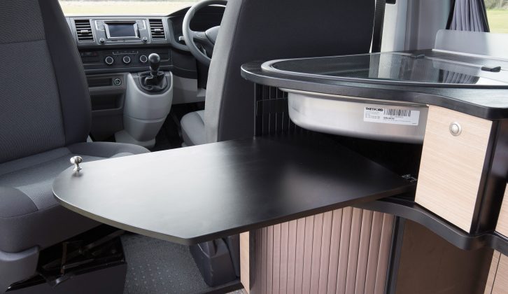 The passenger seat swivels and this extra tabletop allows four people to eat together in the Danbury Surf