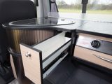 There's more galley storage than meets the eye in this campervan, including a cutlery drawer