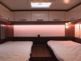 The twin fixed single beds in this well-lit rear bedroom are a major selling point of the Hobby Optima De Luxe V65 GE
