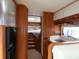 There's a compact central kitchen, a split washroom and a rear master bedroom in the Rapido 8066df