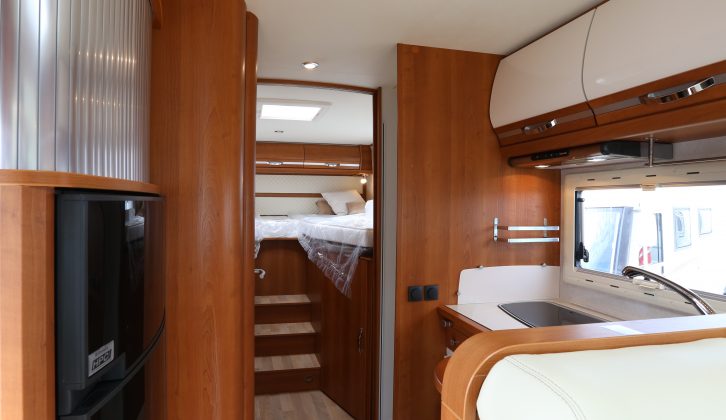 There's a compact central kitchen, a split washroom and a rear master bedroom in the Rapido 8066df