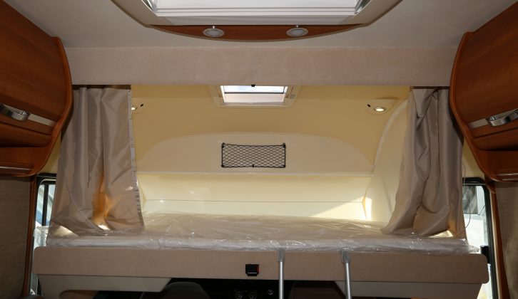 The drop-down bed over the lounge measures 1.91m x 1.4m and is accessed using an aluminium ladder – read more in the Practical Motorhome Rapido 8066df review