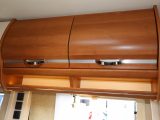 There are nine, solid maple overhead lockers in this motorhome, to help accommodate clothing and supplies for four