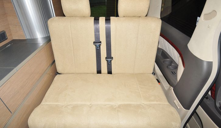 The travel seat at the rear of the Alphard can easily accommodate two, and includes removable head restraints