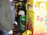 Al researches the amusement arcade, ready for a return trip with the children!