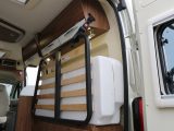 The slatted bed base and mattress are held securely out the way – read more in the Pilote Foxy Van V540G review