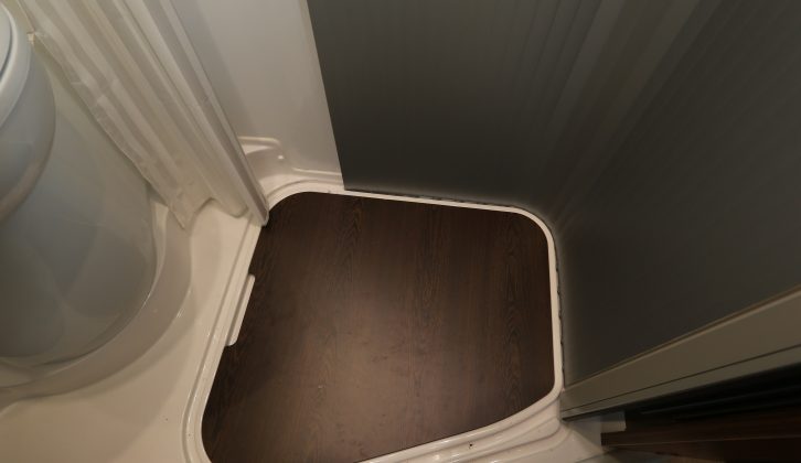 Remove this wooden infill and the washroom floor becomes the shower tray – there's a shower curtain provided