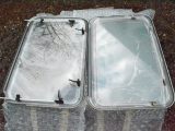 The stays and latches must be transferred from the damaged old window (left) to the replacement window (right)
