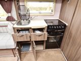 You get a separate oven and grill plus good storage in the Auto-Sleeper Corinium FB's kitchen