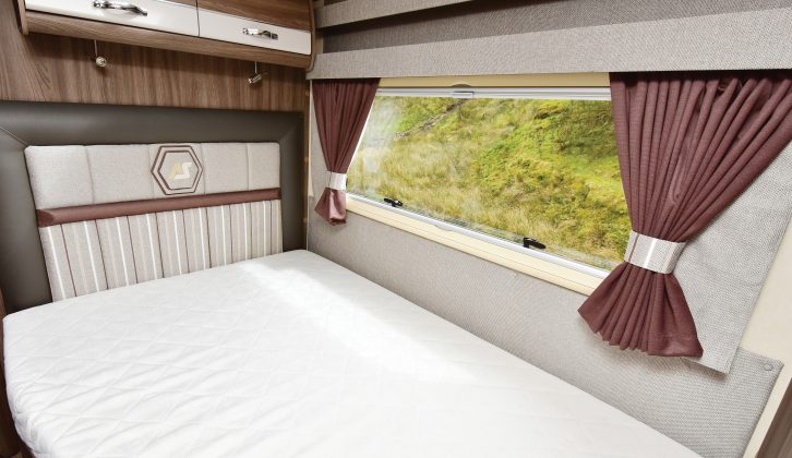 A padded headboard will make sitting up in bed comfortable, and there’s a locker each for personal effects and that large window lets in plenty of daylight