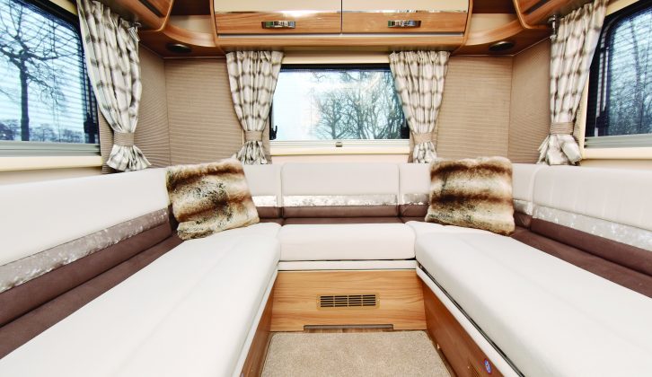 The rear lounge seats six and a large table fits here; at night it converts to a big double bed
