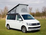 Our test VW campervan looks resplendent in its Oryx White
pearlescent paint (£606) – the awning is a £396 option