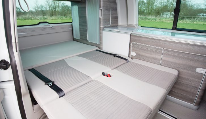The bench seat has fold-away head restraints and can be opened to form a good-sized double bed