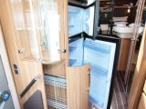 The glazed glass cabinet will be fully stocked with appropriate vessels before delivery – the two-door fridge-freezer is of domestic size