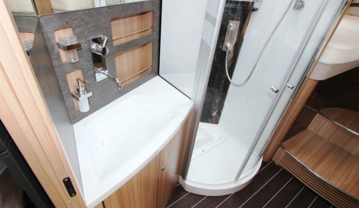 Attractive panelling, varied storage and a contemporary mixer tap are pleasing, and the integrated (no-plug) drainage really wows – read more in the Practical Motorhome Knaus Sun I 900 LEG review