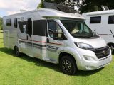 The 2017 Adria Coral Platinum Collection S 690 SC has an island bed and washroom split across the ’van